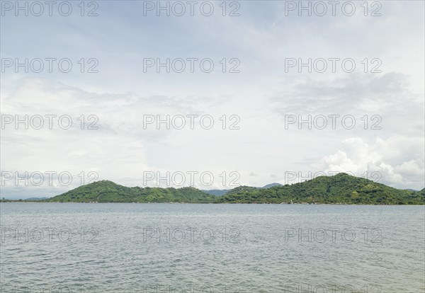 Lombok and Gili Air islands, overcast, cloudy day, sky and sea. Vacation, travel, tropics concept, no people. Sunny day