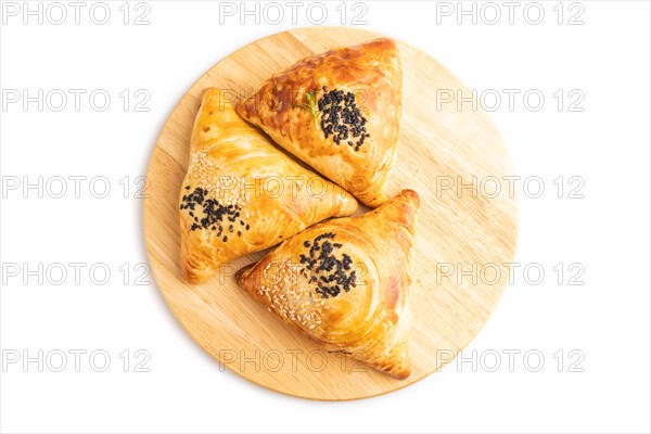 Homemade asian pastry samosa isolated on white background. top view, flat lay, close up