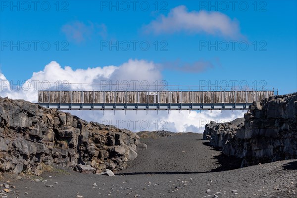 Bridge between the continents crosses the rift valley between the American and European continental plates, Reykjanes Peninsula, Iceland, Europe