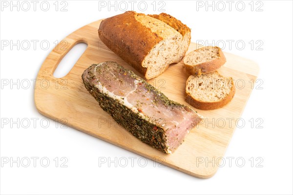 Bread with jerky salted meat on wooden cutting board isolated on white background. side view, close up