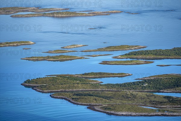 Rocky islands in the blue sea, sea with archipelago islands, Ulvagsundet, Vesteralen, Norway, Europe