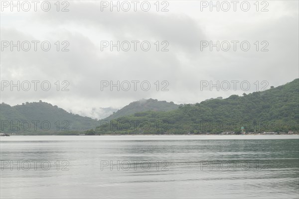 Lombok and Gili Air islands, overcast, cloudy day, sky and sea. Vacation, travel, tropics concept, no people