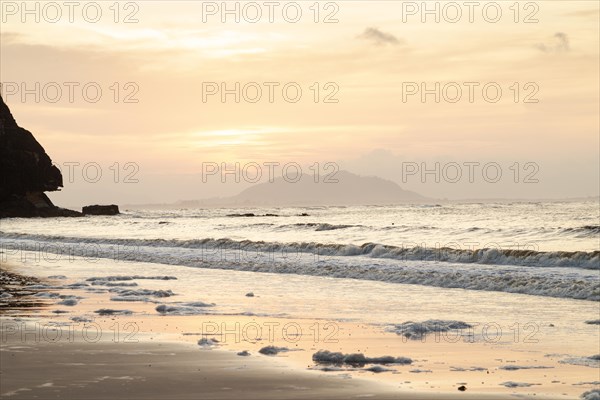 Bako national park, sea sandy beach, overcast, cloudy sunset, sky and sea, low tide. Vacation, travel, tropics concept, no people, Malaysia, Kuching, Asia