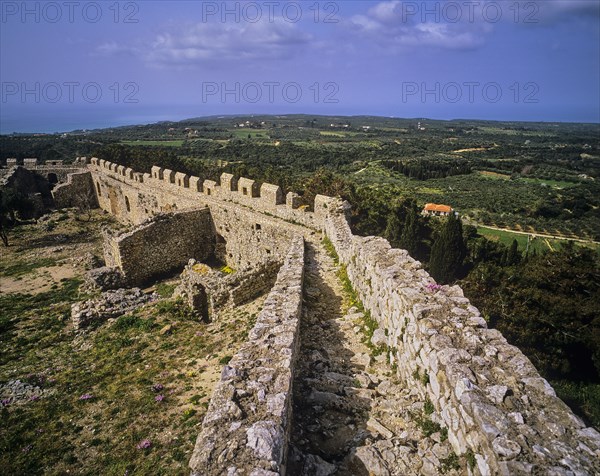 Fortress walls stretching over hilly terrain with lush vegetation, Chlemoutsi, High Medieval Crusader Castle, Kyllini Peninsula, Peloponnese, Greece, Europe