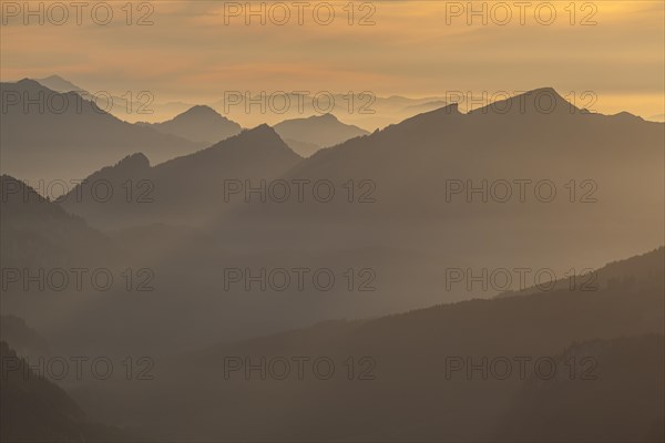 Mountain peak as silhouette in the evening light, haze, backlight, view from Nebelhorn to Allgaeu Alps, Allgaeu, Germany, Europe