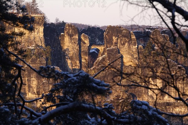 View from the Rauenstein to the Bastei rocks, winter evening, Saxony, Germany, Europe