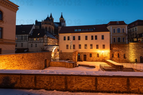 Historic courtyard of the Moellenvogtei, behind it half-timbered houses and cathedral at dusk, Magdeburg, Saxony-Anhalt, Germany, Europe