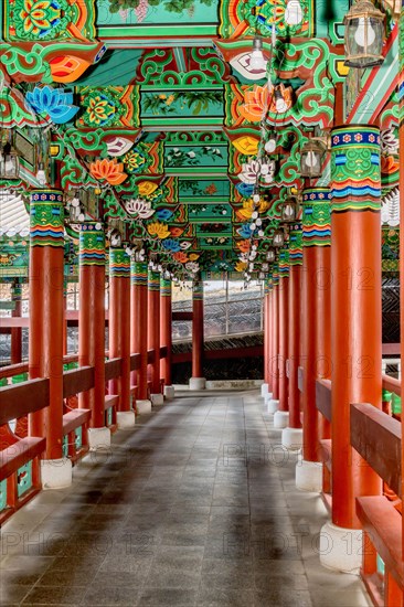 Colorful covered walkway at Buddhist temple in South Korea