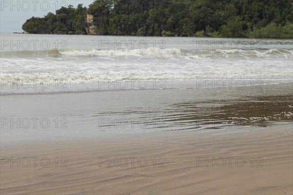 Bako national park, sea sandy beach, overcast, cloudy day, sky and sea. Vacation, travel, tropics concept, no people, Malaysia, Kuching, Asia