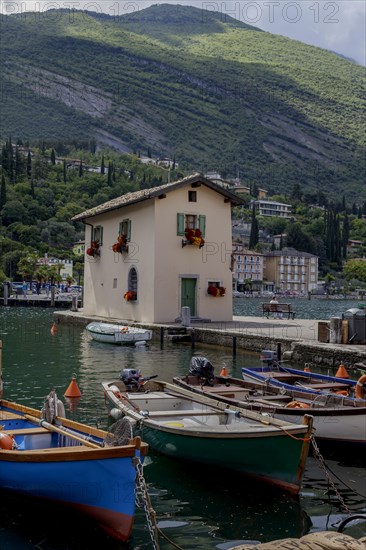 Casa del Dazio customs house at the harbour, built in the 18th century by the Habsburgs on the border between Italy and Austria, Torbole, Lake Garda, north shore, Trentino, Italy, Europe