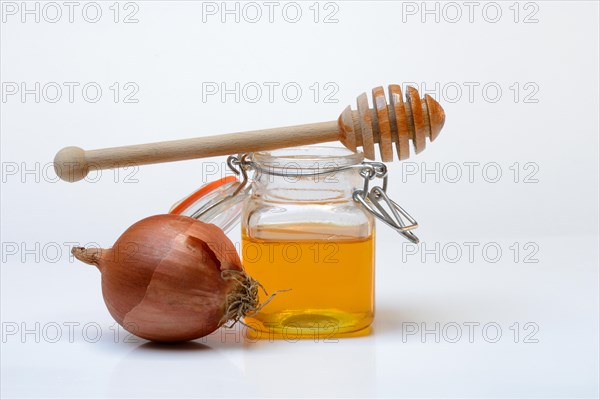 Honey in a jar and onion, ingredients for cough syrup