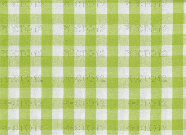 Green and white chequered fabric texture background