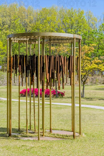 Sculpture: Wind chimes of rusted metal pipes at DMZ Peace Park. Artist unknown in Goseong, South Korea, Asia