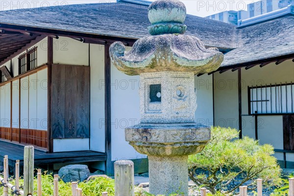 Closeup of stone carved lantern in public park in Hiroshima, Japan, Asia