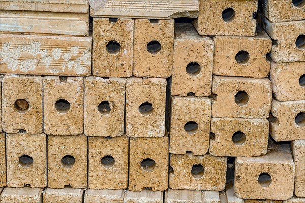 Closeup of clay bricks stacked neatly on top of each other in South Korea