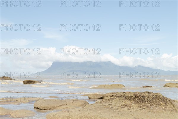 Cliff in Bako national park, sunny day, blue sky and sea. Vacation, travel, tropics concept, no people, Malaysia, Kuching, Asia