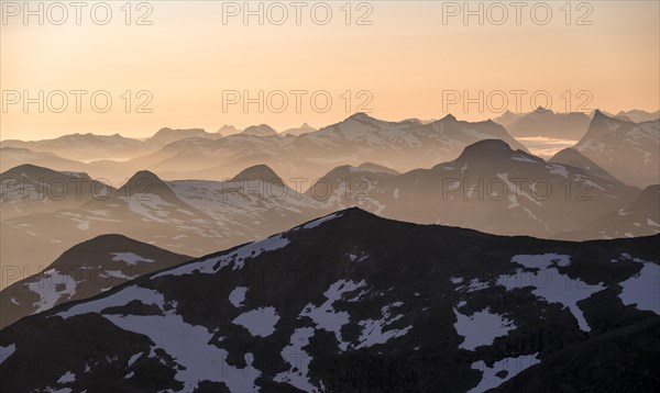 Mountain panorama, mountain peaks in soft light at sunset, view from the summit of Skala, Loen, Norway, Europe