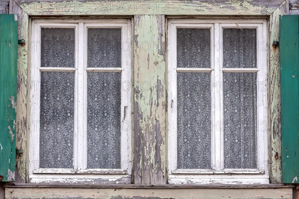 Window with peeling paint and curtains, Palatinate, Rhineland-Palatinate, Germany, Europe
