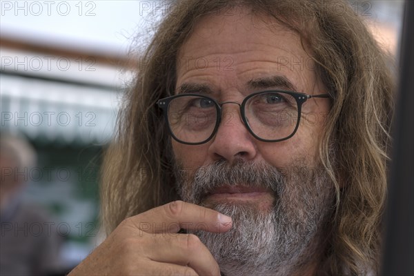 Portrait of a man with beard and glasses, Genoa, Italy, Europe