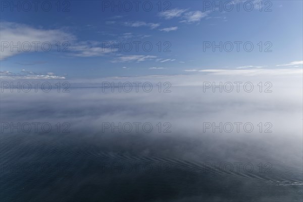 Coastal seascape in fog, Gulf of Saint Lawrence, Province of Quebec, Canada, sea, water, blue, North America