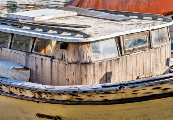 Derelict wood boat in dry dock at harbor in Istanbul, Tuerkiye