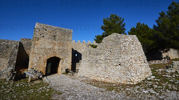 Sunny view of the entrance gate of an old fortress ruin, Chlemoutsi, High Medieval Crusader Castle, Kyllini Peninsula, Peloponnese, Greece, Europe