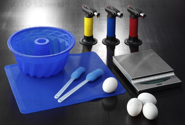 Food, various baking utensils, kitchen scales, eggs