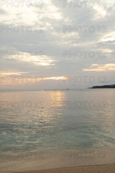 Lombok and Gili Air islands, overcast, cloudy day, sky and sea. Vacation, travel, tropics concept, no people. Sunset, sand beach