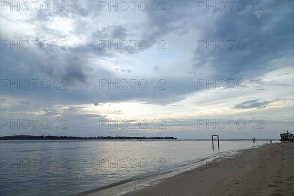 Lombok and Gili Air islands, overcast, cloudy day, sky and sea. Vacation, travel, tropics concept, no people. Sunset, sand beach