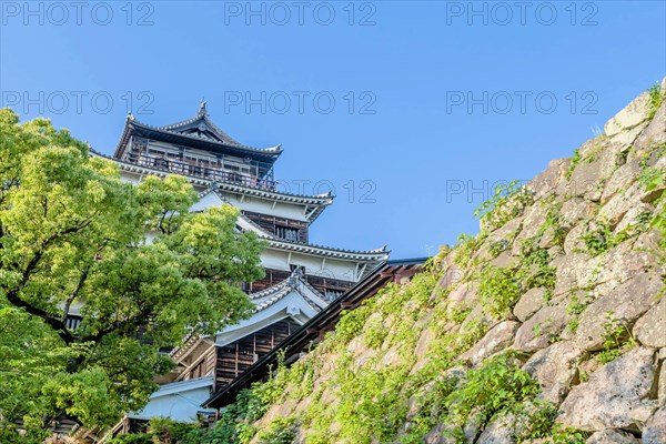 Exterior of Hiroshima Castle on hilltop in Japan