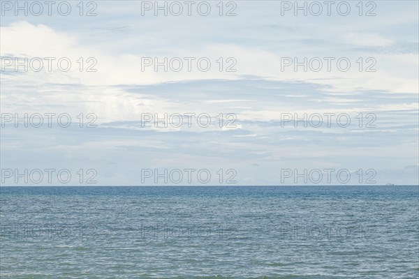 Lombok and Gili Air islands, overcast, cloudy day, sky and sea. Vacation, travel, tropics concept, no people. Sunny day