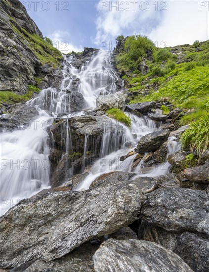 Waterfall on a mountainside, long exposure, Berliner Hoehenweg, Zillertal Alps, Tyrol, Austria, Europe