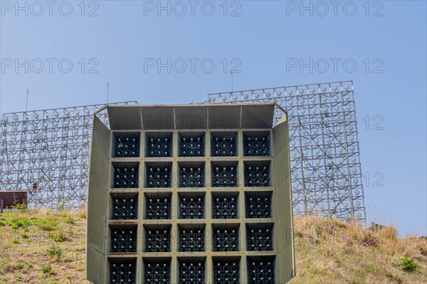 Military array of loud speakers and spot lights on hill overlooking DMZ observation area in Goseong, South Korea, Asia