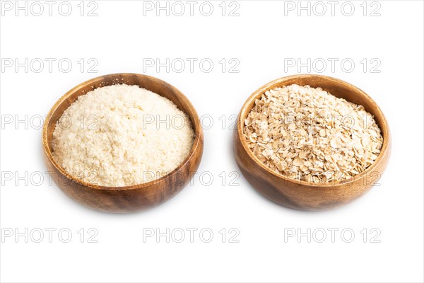 Powdered milk and oatmeal baby food mix, infant formula isolated on white background. Side view, artificial feeding concept