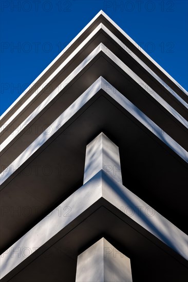 Corner Shape of a Modern Design Building Against Clear Blue Sky in a Sunny Day in Switzerland