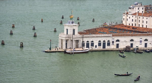 Aerial view from the Bell Tower (Campanile di San Marco) with islands, boats and gondolas in Venice, Italy, Europe