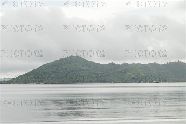 Lombok and Gili Air islands, overcast, cloudy day, sky and sea. Vacation, travel, tropics concept, no people