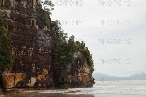 Cliff in Bako national park, overcast, cloudy day, sky and sea. Vacation, travel, tropics concept, no people, Malaysia, Kuching, Asia