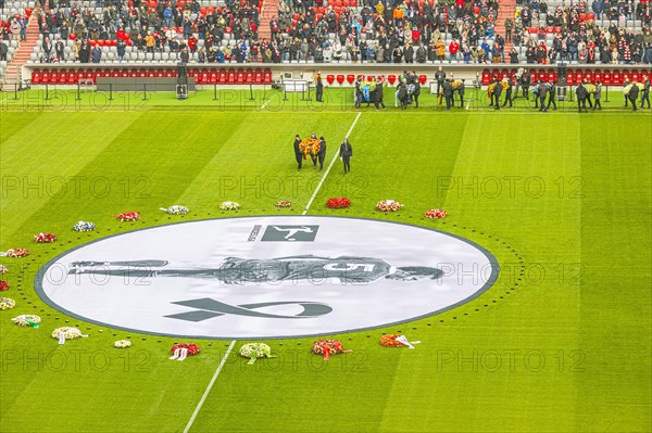 More floral wreaths are brought to the banner, banner with Franz Beckenbauer and floral wreaths, FC Bayern Munich funeral service for Franz Beckenbauer, Allianz Arena, Froettmaning, Munich, Upper Bavaria, Bavaria