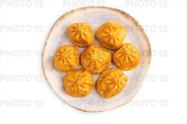 Fried manti dumplings isolated on white background. Top view, flat lay, close up
