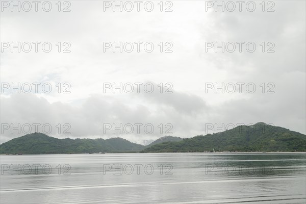 Lombok and Gili Air islands, overcast, cloudy day, sky and sea. Vacation, travel, tropics concept, no people