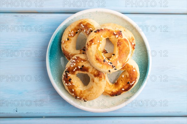 Homemade asian salted cookies, on blue wooden background. top view, flat lay