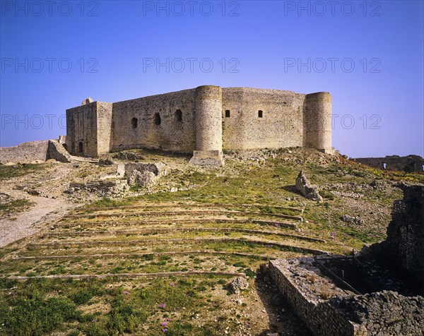 Old fortress with an ancient amphitheatre surrounded by purple wildflowers, Chlemoutsi, High Medieval Crusader castle, Kyllini peninsula, Peloponnese, Greece, Europe