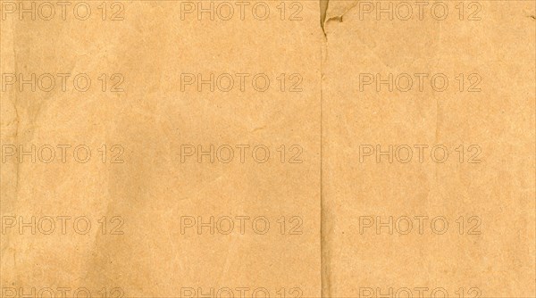 Brown creased paper texture background