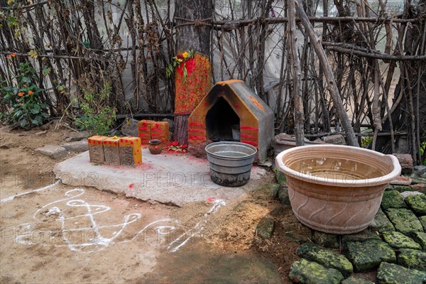 House altar with rangoli patterns and tilaka, Tindivanam-Boodheri, Tamil Nadu, India, Asia