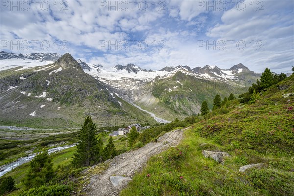 Picturesque mountain landscape with hiking trail, mountain hut Berliner Huette, mountain peak Steinmandl, peak Grosser Moeseler and glacier Waxeggkees and Hornkees, Berliner Hoehenweg, Zillertal Alps, Zillertal, Tyrol, Austria, Europe