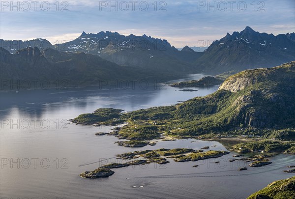 Fjord Raftsund and mountains in atmospheric evening light, view from the summit of Dronningsvarden or Stortinden, Vesteralen, Norway, Europe