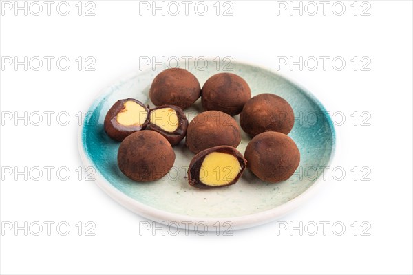 Japanese rice sweet buns chocolate mochi filled with cream isolated on white background. side view, copy space