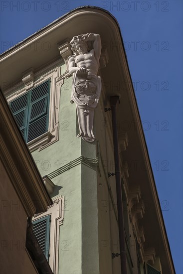 Sculpture of an altant as a roof support, Genoa, Italy, Europe