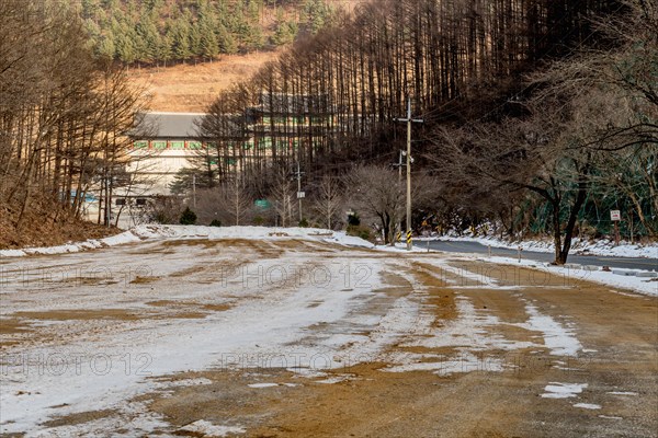 Winter landscape of road to Guinsa temple in background in South Korea